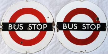 A pair of London Transport 'DOLLY STOP' enamel BUS STOP SIGNS, temporary bus stops used for