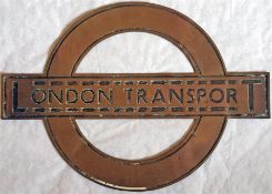 A 1930s bronze BULLSEYE SIGN 'London Transport' with the diamond cut-outs in the over and