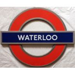 London Underground enamel roundel STATION SIGN 'WATERLOO'. A modern "silhouette" roundel in an