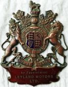 A brass Leyland Motors Ltd "By [Royal] Appointment