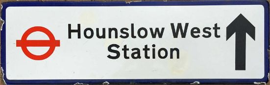 Flanged enamel DIRECTIONAL STREET SIGN 'Hounslow West Station' with arrow and London Transport