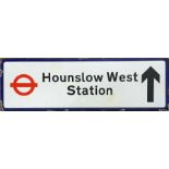 Flanged enamel DIRECTIONAL STREET SIGN 'Hounslow West Station' with arrow and London Transport