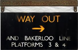 A London Underground CELLULOID SIGN (with white/yellow backing) 'Way Out & Bakerloo Line,