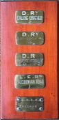 Collection of London Underground brass CASH BAG TAGS comprising Ealing Common 2, West Kensington 3