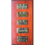 Collection of London Underground brass CASH BAG TAGS comprising Ealing Common 2, West Kensington 3