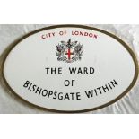 A City of London WARD BOUNDARY SIGN 'The Ward of Bishopsgate Within'. An oval enamel sign in its