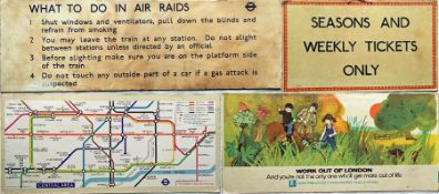 London Underground EPHEMERA, all paper on hardboard, comprising a WW2 air raids NOTICE (stained,