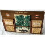 1950s London Transport wooden DISPLAY RACK lettered 'On Sale here' with two small LT bullseyes of