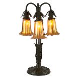 Steuben Glass Works / R. Williamson Co., lamp shades, three, on a table lamp base, Corning, NY /