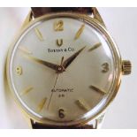 Tiffany 14K Automatic Men's Wristwatch Mid 20th century, 14K gold "Automatic 28" watch having