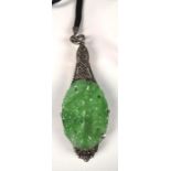 Art Deco Jade Marcasite Silver Lorgnette Circa 1930, a lorgnette mounted with carved green jade