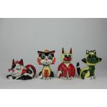 Four Lorna Bailey model cats, to include a recumbent cat and a cheeky seated cat in red and yellow,