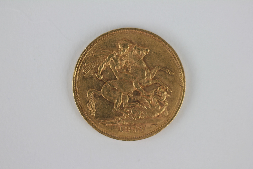 A Queen Victoria 1879 gold sovereign, young head, - Image 2 of 2