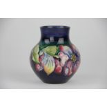 A Moorcroft Anemone pattern vase, script initials W.