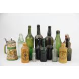 Three 19th century green glass wine bottles,