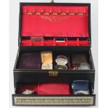 A quantity of jewellery in a jewellery casket, to include, brooches, beads, earrings,
