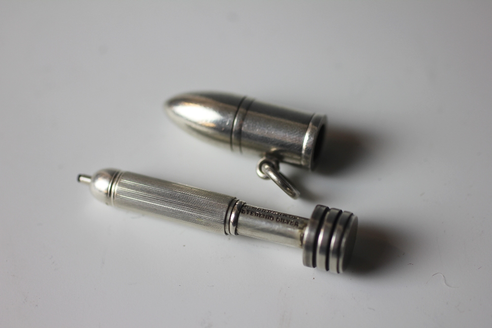 A Sampson Mordan and Co novelty silver 'bullet' propelling pencil,