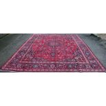 A hand woven wool Mashad carpet, deep pile,