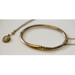 A 9ct gold hinged bangle and a cameo pendant and chain (2)