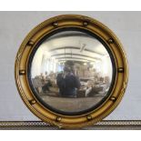 A Regendy style convex wall mirror, 39cm, with a neo-rococco gilt gesso cartouche shaped mirror,