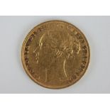 A Queen Victoria 1879 gold sovereign, young head,