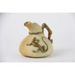 A Royal Worcester blush ivory lizard jug dated 1917,