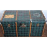 A bentwood bound faux tartan travel trunk, with leather handles,