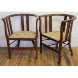 A pair of Edwardian inlaid mahogany salon tub chairs,