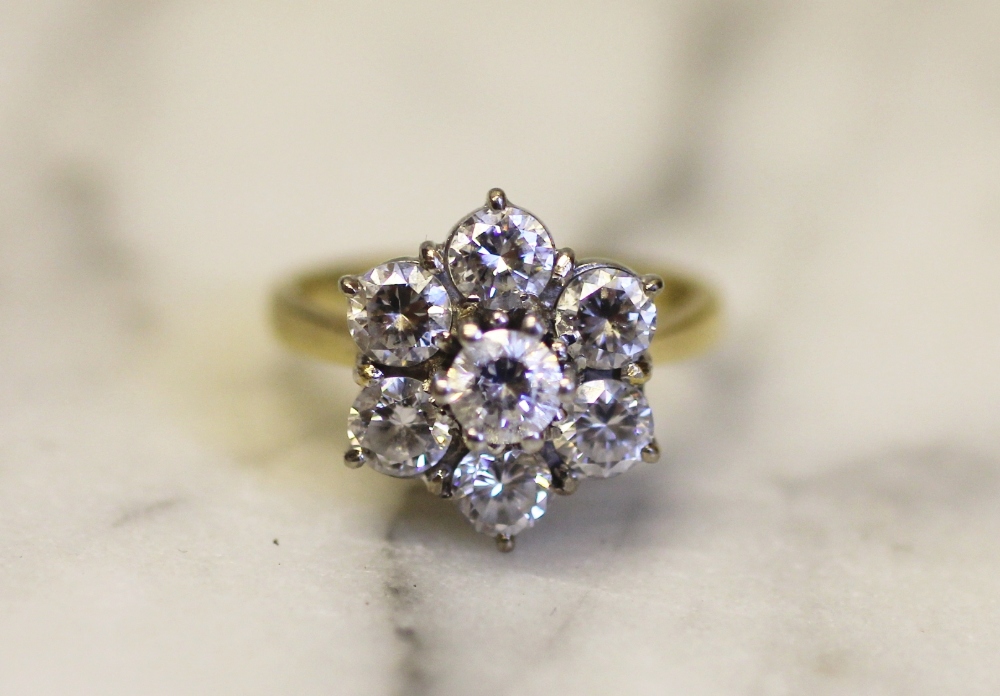 A seven stone diamond cluster ring, - Image 2 of 2