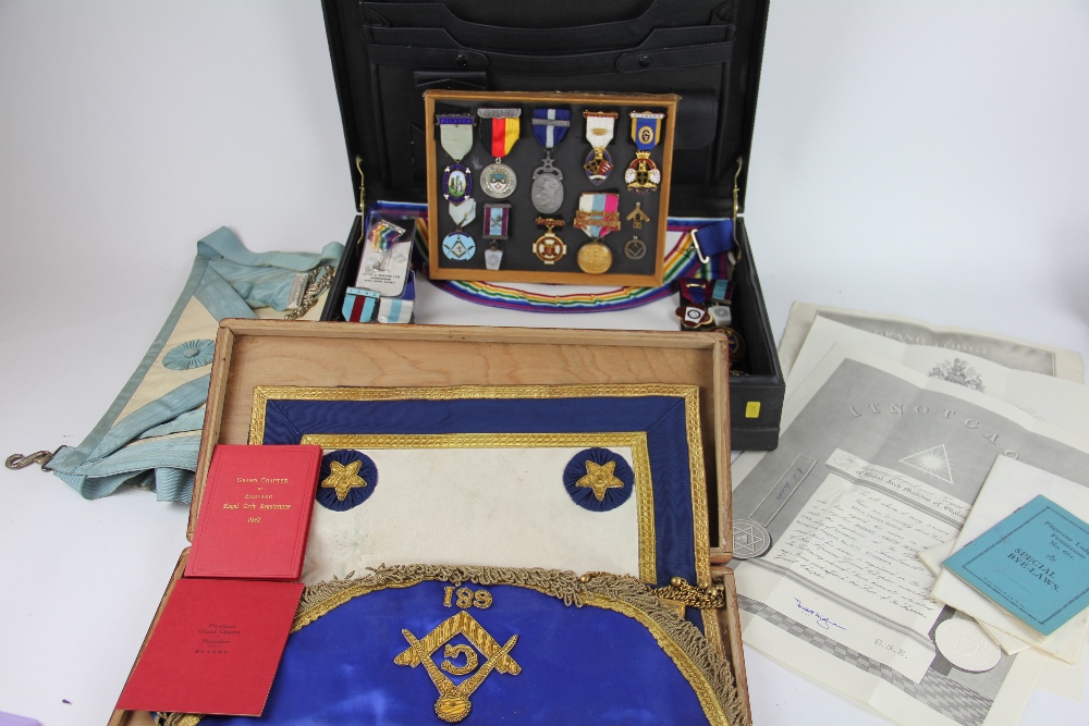 A collection of Masonic enamel badges and medals, comprising a Staffordshire & Shropshire pendant,