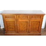 A modern inlaid burr walnut sideboard, with three drawers and three cupboard doors,