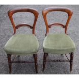 A set of four Victorian ash dining chairs, with upholstered seats,