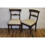 A set of six Regency rosewood dining chairs,