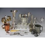 A collection of silver plated wares, to include; a pair of candelabra, a trumpet vase,