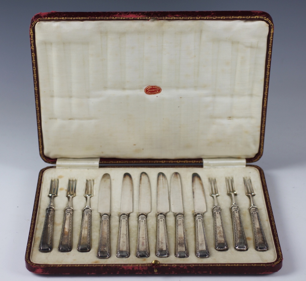 An Edwardian cased set of six silver desert knives and forks, Thomas Bradbury and Sons Ltd,