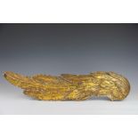 A 19th century carved gilt wood and gesso angel wing,