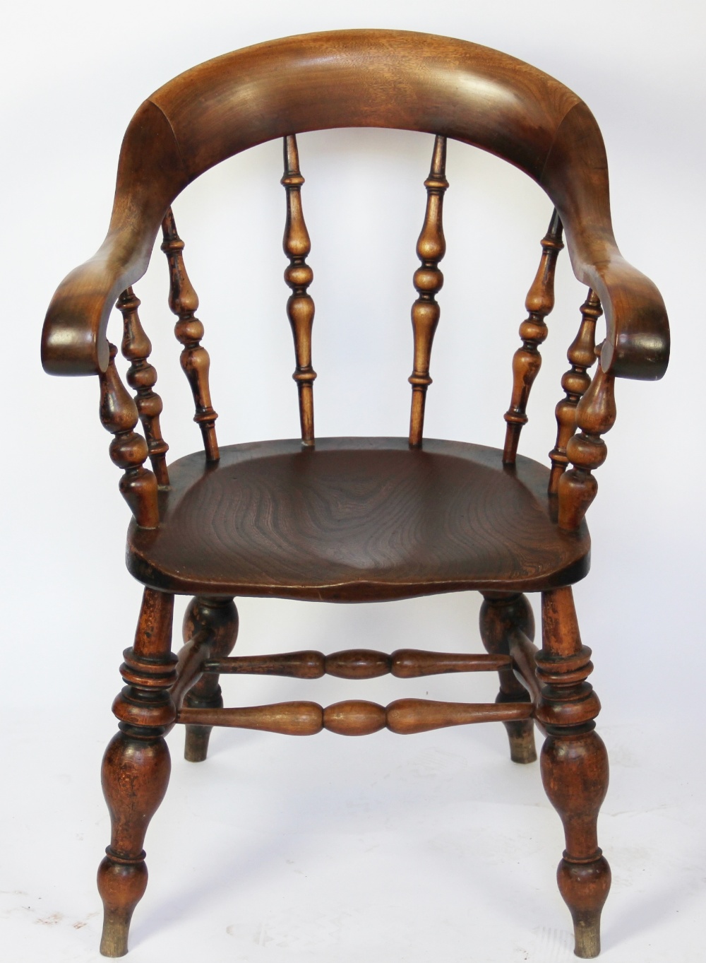 A 19th century beech and ash captains chair,