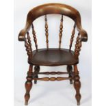 A 19th century beech and ash captains chair,