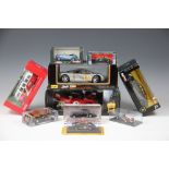 A collection of boxed toys, to include; Maisto Special Edition Maclaren F1,