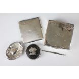 A collection of silver to include; a silver cigarette box,