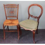 Three Victorian carved walnut dining chairs, on cabriole legs,