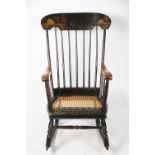 A 19th century American pine and maple rocking chair in the manner of Samuel May of Boston,