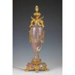 A 19th century French ormolu mounted pale red marble table lamp,