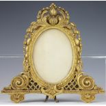 A 19th century gilt gesso easel picture frame,
