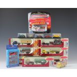 A collection of die cast model cars and other vehicles,