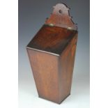 A George III oak candle box, of tapering form,