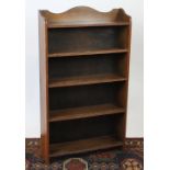 An open oak five tier bookcase, 102cm H,