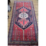 A Caucasian hand woven wool runner,