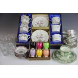 A cased set of six Coalport exotic bird decorated coffee cups and saucers,