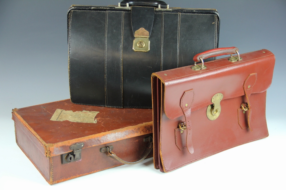 A gentleman's tan leather document case, with brass clasp (no key),